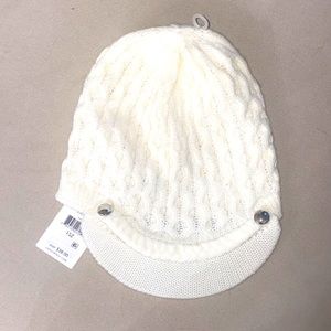 White knit Calvin Klein beanie with bill.